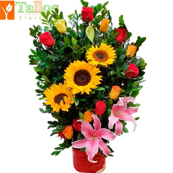 arreglo floral con girasoles rosas y lirios en base de cerámica para regalo con entrega en Lima