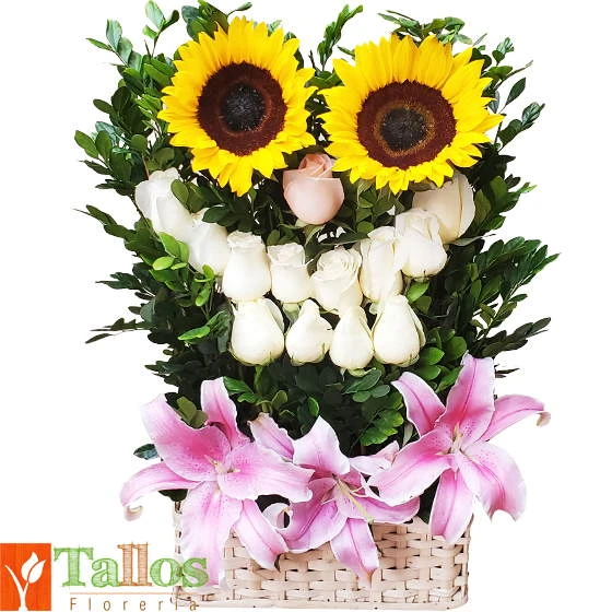 Arreglo floral con rosas blancas lirios rosados y girasoles en cesta ideal para regalo elegante y colorido para cumpleaños o cualquier ocasión con delivery en Lima