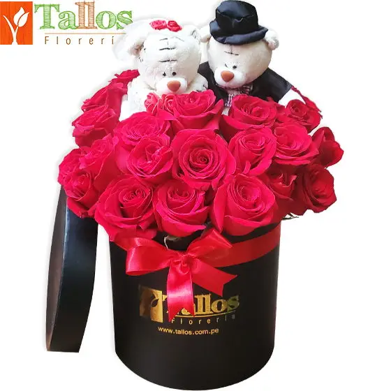 novios en box con flores para regalo romántico delivery de flores hoy en Lima