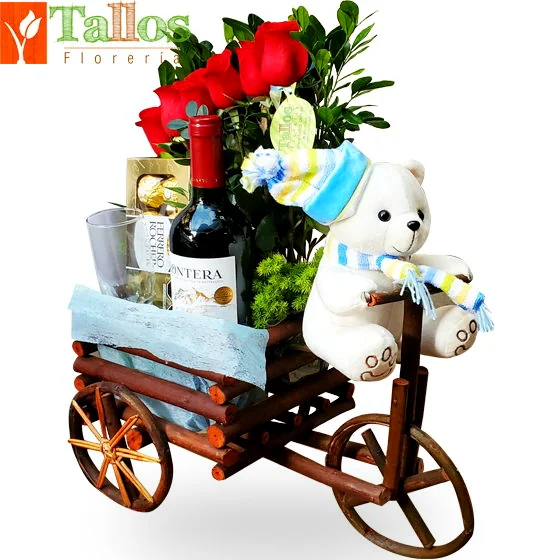 Arreglo floral con peluche vino y chocolates para regalo romántico con entrega a domicilio en Lima ideal para aniversario o cumpleaños
