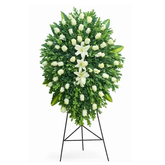 Arreglo floral de condolencias con rosas blancas y lirios blancos para velorios elegante y sobrio con delivery en Lima